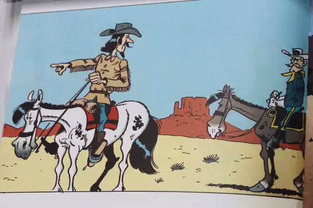 Livre de lecture pour enfants lucky luke sur les trappeurs.. in Comics & Graphic Novels in Laval / North Shore - Image 5