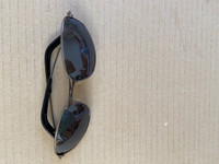 Grey metal frame unisex sun glasses lightly tinted grey lenses