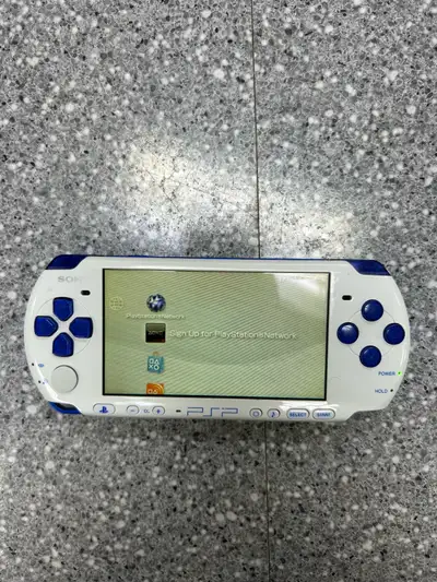 PSP 3000 Japan Release Blue/White Comes with cable and charger Item # 151250 We do offer a 30 day wa...