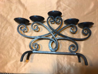 Beautiful black cast iron candle holder. Centre piece or firepla