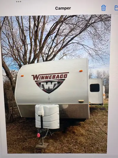 Well built high end unit. Super slide. Lots storage. Large windows. Leather couch and recliner. Hide...