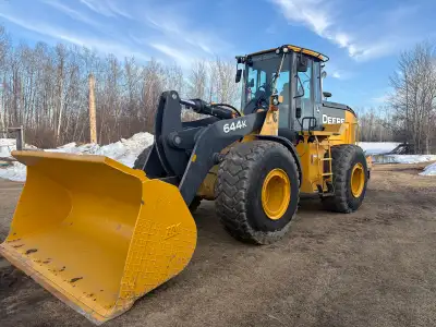 2015 644 K Wheel Loader. Comes with quick attach, Auxiliary Hydraulics, 4.5 yard bucket, Ride Contro...