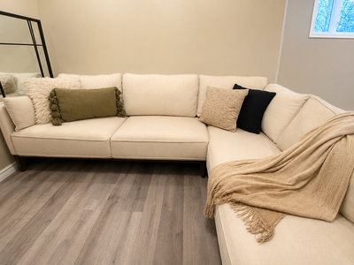 Cindy Crawford Home sectional sofa from The Brick, purchased new about 1 year ago for $3,299.97 + ta...