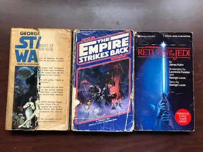 Original trilogy books. Star Wars (worn, half front cover missing, and picture pages taped in) Empir...