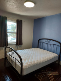 Queen size bed frame and mattress $350