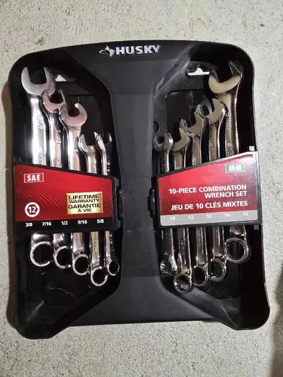 This Husky 10-piece combination wrench set includes both SAE and Metric sizes, ensuring you're equip...