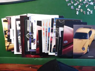A collection of 35 1995 new car ads and promo material. Collected at the Detroit new car show. Used...