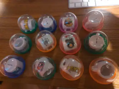 12 mini hockey mugs, from Gumball machines, still in container. Excellent condition Text 4039989667