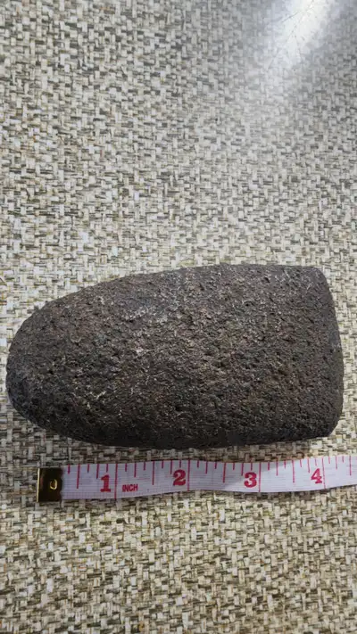 Crafted with meticulous attention to detail, this genuine Authentic Native Stone Tomahawk head is a...