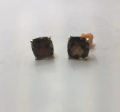 Description: Pair of cage-set amber stud earrings in 14k gold. Lightweight at 1.54 grams. No butterf...