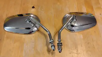 Harley-Davidson motorcycle mirrors, one small chip in one of the mirrors but in good shape no rust.