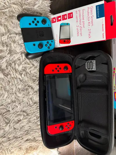REALLY GOOD PRICE TO PASS UP!!!! Selling a Nintendo switch with 2 controllers, screen protector that...