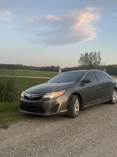 Selling my 2013 Toyota Camry LE due to moving to another province. The car is in good mechanical con...
