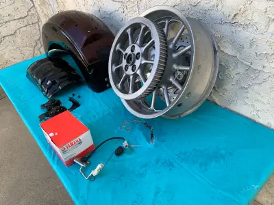 I have: rear control arm $500., rear shock $300., rear wheel assembly with pulley and brake rotor $4...