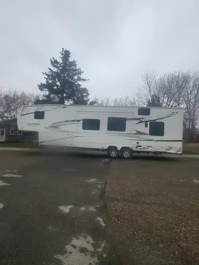 Will trade for motor same value Trailer is a toy hauler and js 36 feet only used 5 times and sold as...