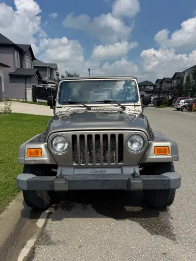 Jeep TJ 2006 SPORT, Six Speed Manual Transmission, Dana 44 Rear differential Air conditioner and hea...