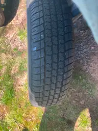 3 trailer tire for sale 13" X 5 bolt good for yard trailer