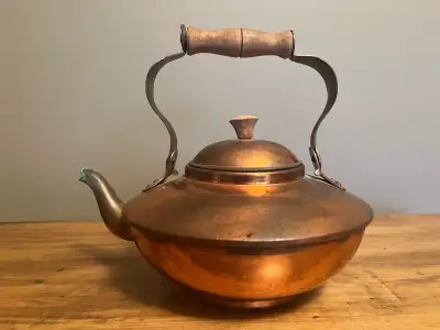 Vintage and very rustic copper tea kettle from the 1930s. Made from hammered copper, this art deco p...