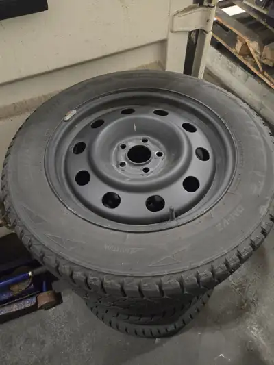 Selling my Bridgestone BIizzak DMV2 Winter tires on rims with sensors. 225/60/R17. Low kms on tires....