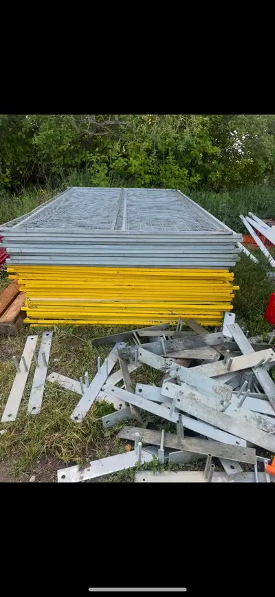 Temporary Fence Panels for sale Galvanized & yellow $40 each panel top pin and bottom stand is inclu...