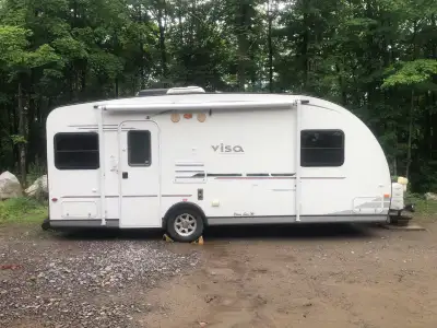 Spacious vacation RV for a couple or young family. Only been used as a place to eat, shower, and lay...