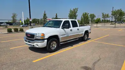 2003 GMC Sierra 2500HD0 297332 KM 6.0 Gas V8 4L80 auto trans Push button 4X4 Grey cloth interior wit...