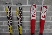 Two downhill skis K2 and Atomic 140 nominal skis and bindings