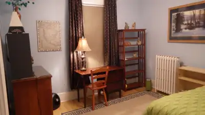 In my home I have a furnished bedroom to rent to a boarder. Single bed, closet, bureau, desk & chair...