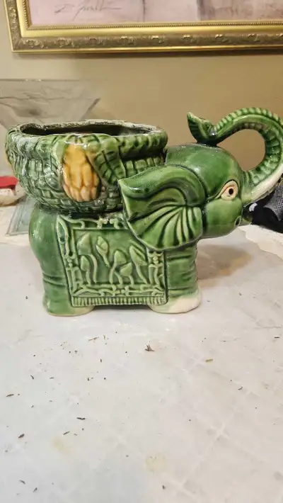 Elephant style ceramic vase, View more