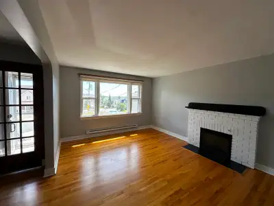 This freshly renovated three-bedroom rental occupies the top floor of a home just steps from Downtow...