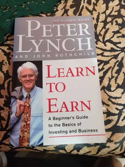 Dive into the basics of investing and business with this classic guide, 'Learn to Earn' by Peter Lyn...