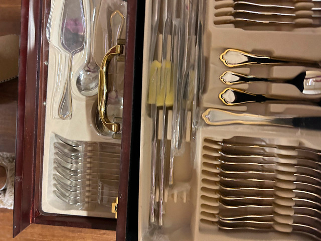 Gold rimmed 12, 5 piece place settings cutlery (unused) in Kitchen & Dining Wares in Hamilton