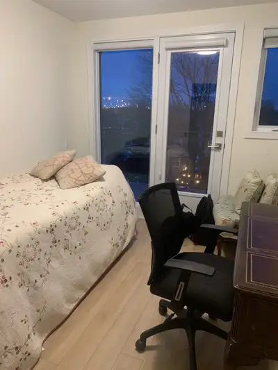 This beautifully furnished bright room is located in a two story home and has access to its own balc...