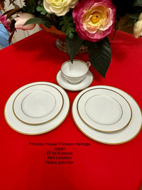$7 take all heavy gold trim dishes and tea set