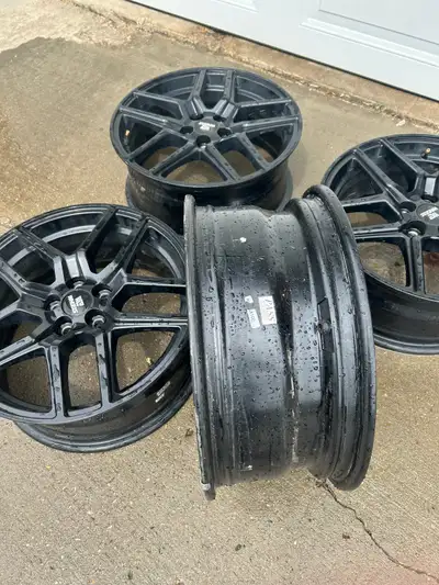 Montegi Black 17 x 7 Rims. 56.1 centre bore. Offset + 40 mm. 5 on 100 bolt pattern. Medicine Hat.