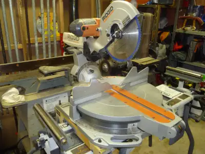 **SOLD** RIDGID DUEL BEVEL SLIDING MITRE SAW, View more