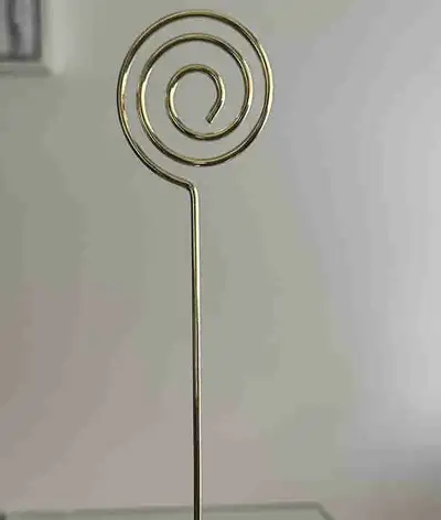 Selling 10 tall table number holders. They are stainless steel and exquisite! Each one measures 8.7i...