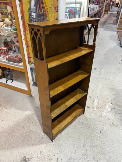 Nice older solid wood bookshelf. Has a bit of wear but still a nice shelf Dimensions are in the phot...