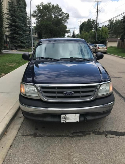 2003 Ford F150 XLT Super Crew (6seats) with Canopy