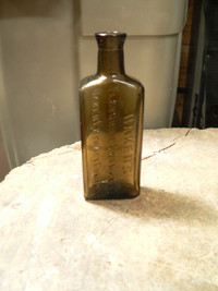 plusieurs bouteille antique ambré embossé a différent prix