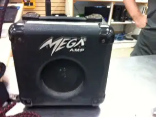 Mega brand mini guitar/bass practice amps as pictured in pics1 $75e will trade4 shortneck-light or k...