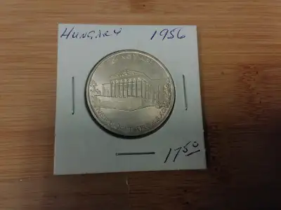 1956 Hungary 10 Forint Coin $18 The 1956 Hungary 10 forint coin features the national emblem, the Hu...