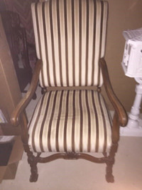 Antique Arm Chair - upholstered with clam shell design at bottom