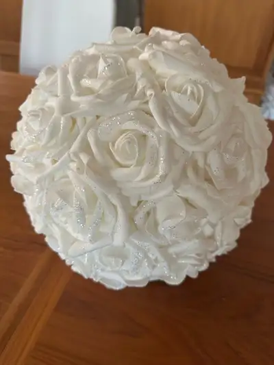 Beautiful artificial flower ball. White roses with white sparkles. Makes a beautiful centrepiece. Me...