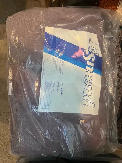 Snuggle up in ultimate comfort with this Esmond Belair mélange blend blanket, boasting dimensions of...