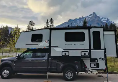 2020 Eagle Cap 1165, like new! Gorgeous, spacious, triple-slide, dry bath, luxury camper with unique...