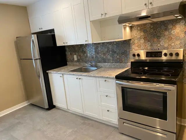 TWO BEDROOM APARTMENT WITH PARKING - CENTRAL LOCATION