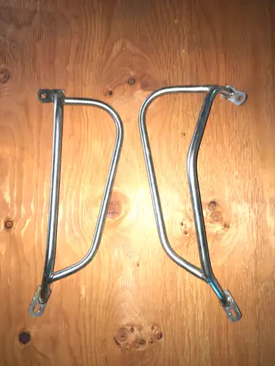 Stainless steel, side panel guards. Helps keep luggage from ruining side covers. In like new conditi...
