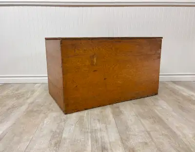 This handmade box or chest would make a great rustic coffee table. Would be neat with castor wheels....