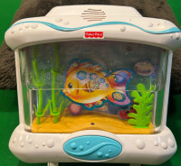 Fisher price aquarium music crib toy